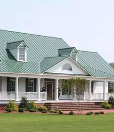home in country with a metal roof
